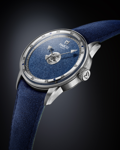 @marcu_geneve 🇨🇭INITIAL

LIMITED EDITION OF 33
 
INITIAL is produced in a run of 33 spanning three versions of 11 watches. The number 33 is guided by discipline, responsibility and meaning.
 
“33 is the number of timepieces I can produce while maintaining full control. Beyond that, I would lose the direct connection with each watch. It is also a personal reference to 1933: the year of my father’s birth. A quiet marker, part of my story.”
Jérôme Marcu
 
The three models are housed in a 40 mm titanium case.
 
 
The three interpretations of INITIAL are presented in a 40 mm Grade 5 titanium case, whose lightness and subtle hue enhance the distinctive character of each creation.
 
The first interpretation features an anthracite dial adorned with the signature “pine needle” motif, complemented by steel hands set with baguette-cut diamonds. A rhodium-plated bezel, highlighted by steel screws and engraved black numerals, completes the composition, while a mouse-grey Alcantara strap adds a refined finishing touch.
 
The second interpretation reveals a golden dial, once again decorated with the “pine needle” motif. Blued hands set with baguette-cut diamonds are paired with a rhodium-plated bezel accented by blue screws and engraved black numerals. The ensemble is finished with a navy-blue Alcantara strap.
 
The third interpretation is distinguished by a deep blue dial, enhanced by the same signature motif. Steel hands set with baguette-cut diamonds are combined with a rhodium-plated bezel featuring blue screws and engraved black numerals. A matching navy-blue Alcantara strap completes this monochromatic composition.
 
 
Each timepiece is individually numbered. The engraving is done by hand on the gear-train bridge, at the heart of the movement.

@martinpulli 🇺🇸